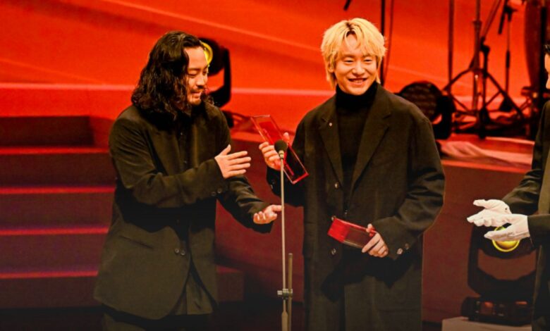 two men on a stage